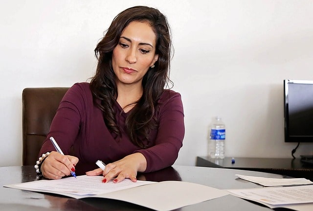 A female realtor doing paperwork